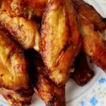 Golden brown Malaysian BBQ chicken wings made with an easy air fryer recipe