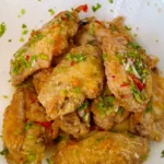 Air Fried Chicken Wings mixed with fish sauce, calamansi, shallots, coriander and chilli. Made with an easy air fryer recipe