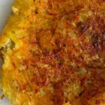 Crispy golden brown potato rosti, cooked over a pan with a super easy recipe.