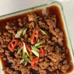 Dark brown Steamed Egg with Minced Pork, made with steamer and pan in this easy recipe