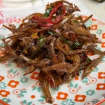 Crispy Anchovies with Soy Sauce, stir fried in a pan with this super easy recipe