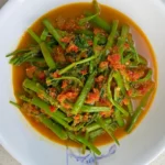 Sambal kangkong or water spinach with chilli paste, aromatic and spicy in this super easy recipe