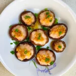 Prawn stuffed shiitake mushrooms, steamed to perfection with a sweet savoury sauce