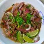Thai Beef Salad, with medium rare beef and a zesty, light and refreshing flavor