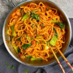 Bacon Kimchi Stir Fry Udon that is spicy, savory and deliciously Korean!